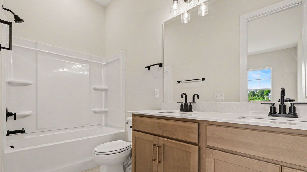 Bathroom located on the first floor at the front of the home