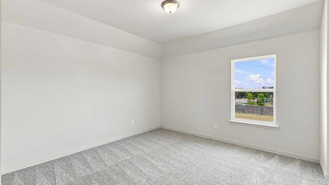 Furnished interior view inside a new home in Taylor Estates, Corinth (Image 9).