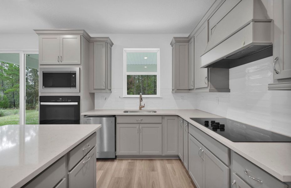 Furnished interior view inside a new home in Hyland Trail, Green Cove Springs (Image 9).