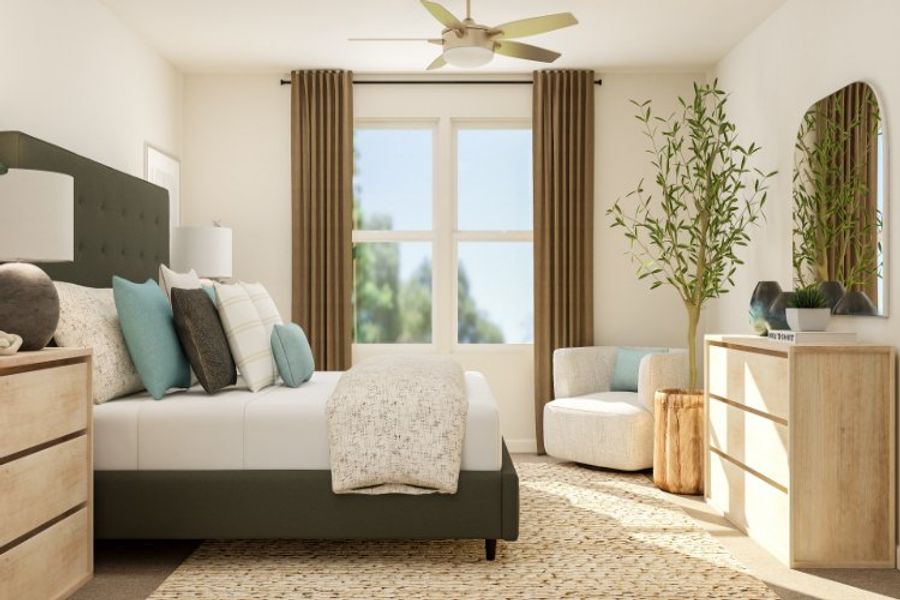 A living room with a couch and a fan. A living room with a couch and a fan.