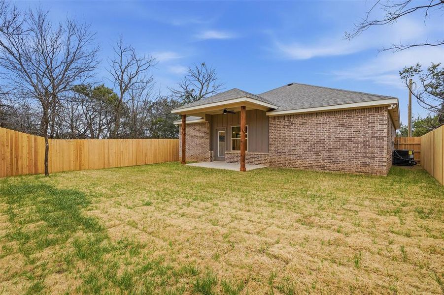 Exterior details and patio area of a home in , Granbury (Image 22).