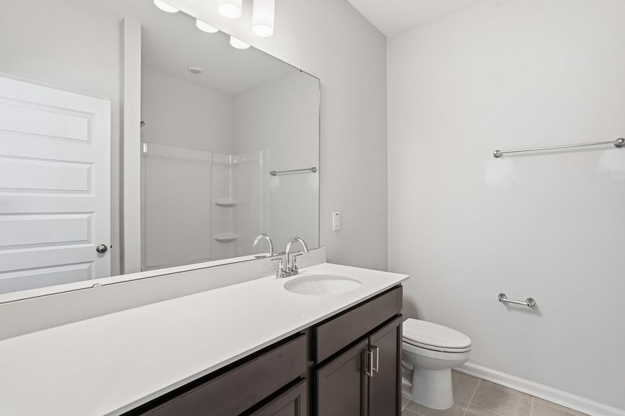 Furnished interior view inside a new home in Ovation at Sweetbrier, Durham (Image 12).