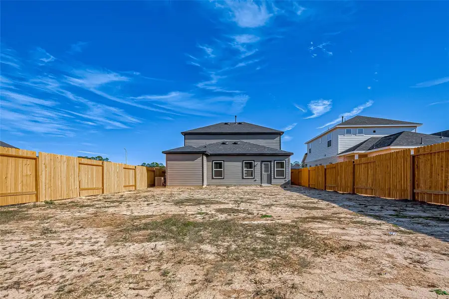 Exterior details and patio area of a home in Mill Creek Trails, Magnolia (Image 2).