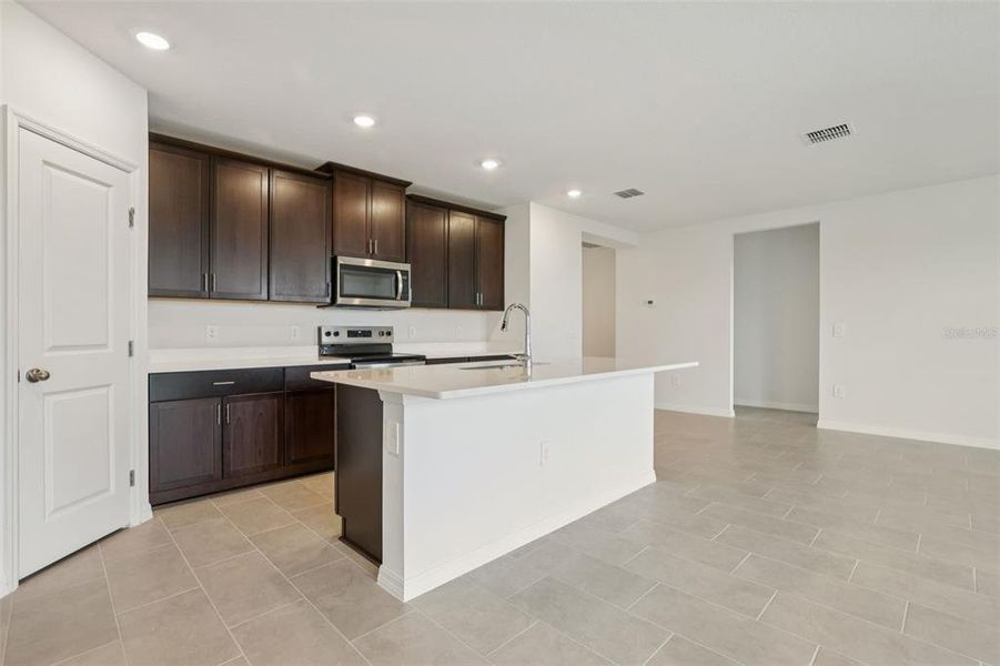 Furnished interior view inside a new home in Wynnstone - Signature Series, Davenport (Image 9).