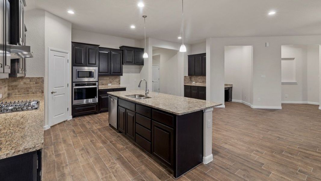 Representative furnished interior of a home built from the Brock by D.R. Horton in Lakeview Pointe, Grand Prairie (Image 10).