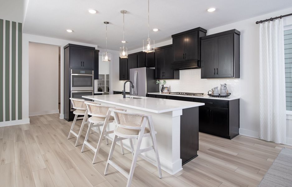 Representative furnished interior of a home built from the Victoria by Tri Pointe Homes in Painted Tree, McKinney (Image 16).