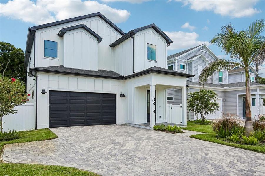 Front exterior of a new home in , St. Petersburg, FL, highlighting curb appeal (Image 26). Front exterior of a new home in , St. Petersburg, FL, highlighting curb appeal (Image 26).