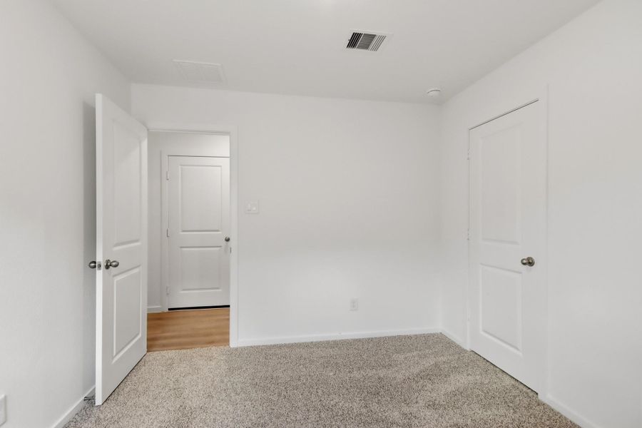 Spacious, unfurnished interior of a new home in New Waverly Station, New Waverly (Image 11). Spacious, unfurnished interior of a new home in New Waverly Station, New Waverly (Image 11).