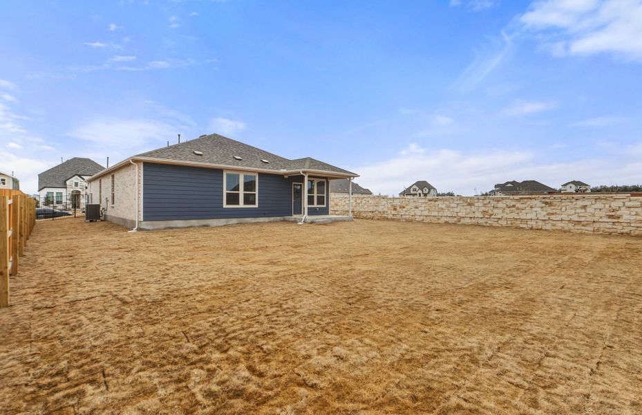 Exterior details and patio area of a home in Saddleback at Santa Rita Ranch, Liberty Hill (Image 30). Exterior details and patio area of a home in Saddleback at Santa Rita Ranch, Liberty Hill (Image 30).