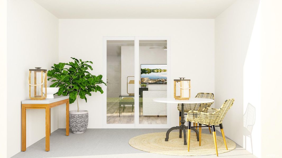 A room with a table chairs and a plant in it. A room with a table chairs and a plant in it.