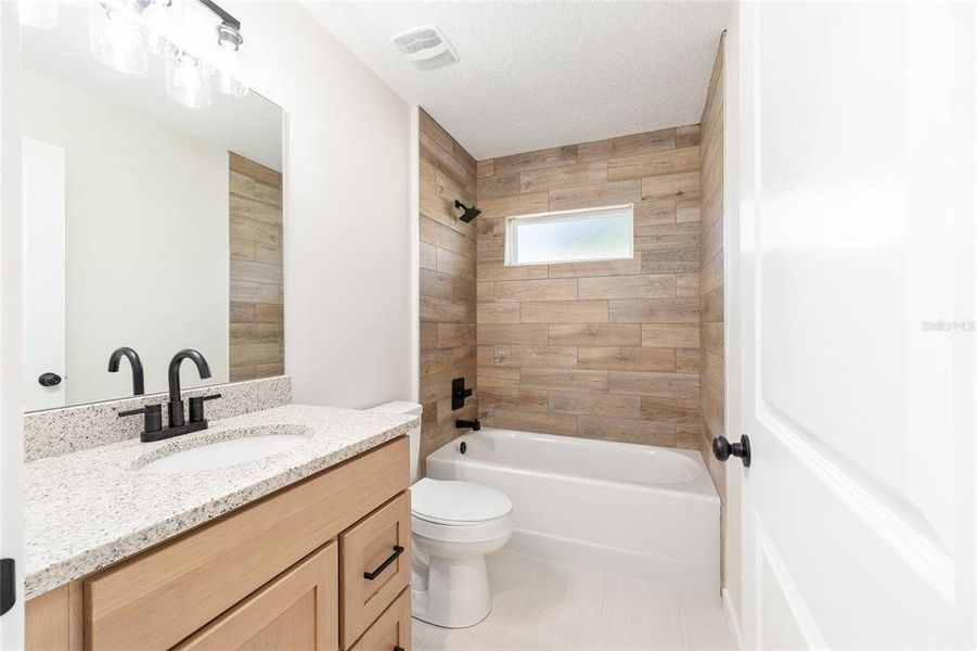 Furnished interior view inside a new home in , Dunnellon (Image 11).