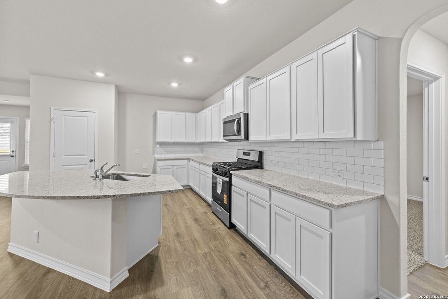 Furnished interior view inside a new home in Riverstone at Westpointe, San Antonio (Image 9).