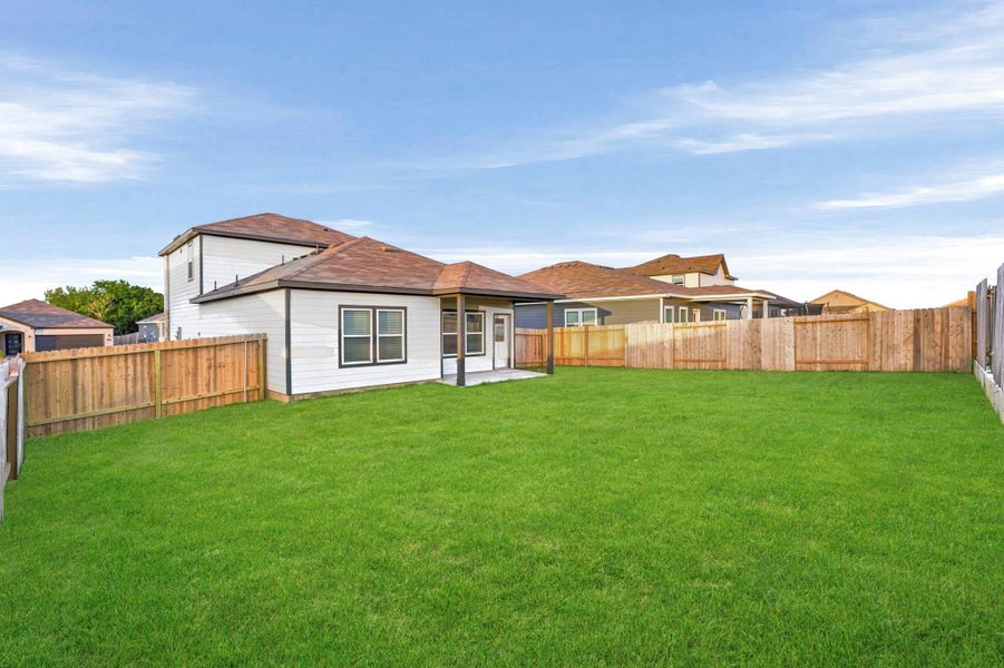 Exterior details and patio area of a home in Reveille Estates, Bryan (Image 3).