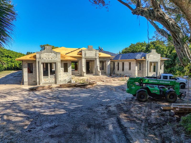 In-progress construction of a new home in , North Palm Beach, FL (Image 1).