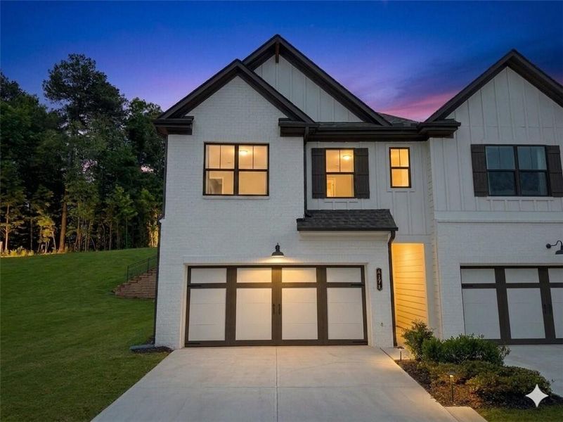 Front exterior of a new home in Millstone at Mundy Mill, Gainesville, GA, highlighting curb appeal (Image 2). Front exterior of a new home in Millstone at Mundy Mill, Gainesville, GA, highlighting curb appeal (Image 2).