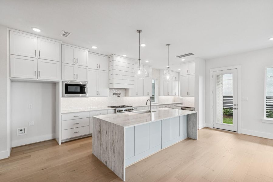 Furnished interior view inside a new home in Easthaven at Bridgeland Central - Vision Collection, Cypress (Image 9). Furnished interior view inside a new home in Easthaven at Bridgeland Central - Vision Collection, Cypress (Image 9).