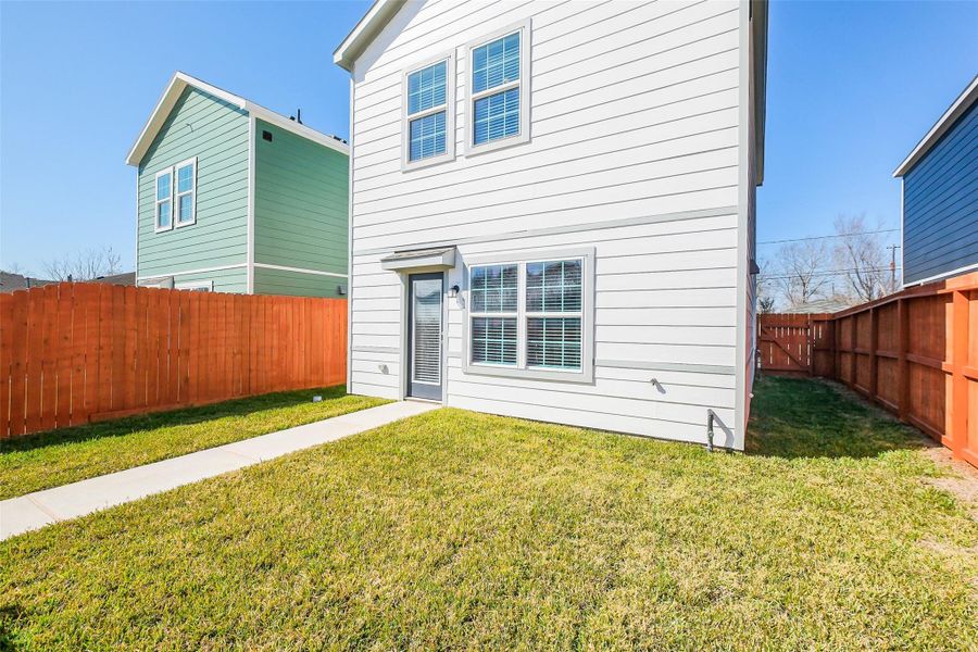 Exterior details and patio area of a home in , Houston (Image 3).