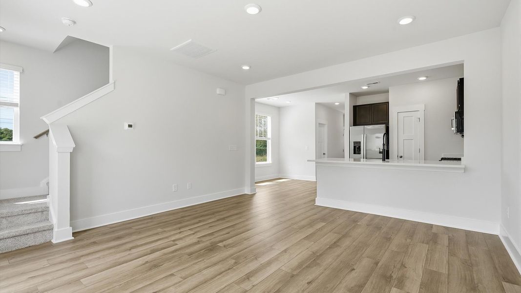 Highly functional family room with established charm and current styling in a reputable community in Anderson, SC