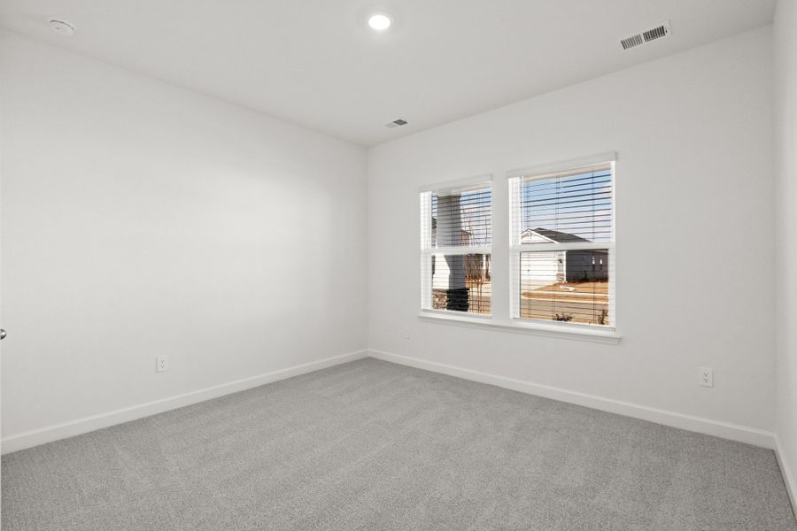 Spacious, unfurnished interior of a new home in Cypress Ridge - The Boardwalk Series, Longs (Image 24).