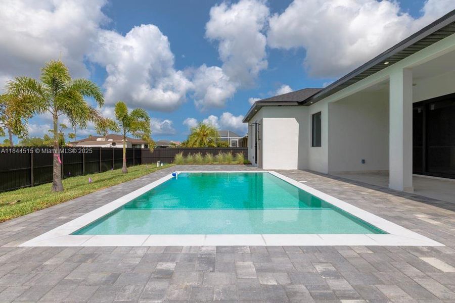 Front exterior of a new home in , Cape Coral, FL, highlighting curb appeal (Image 15).