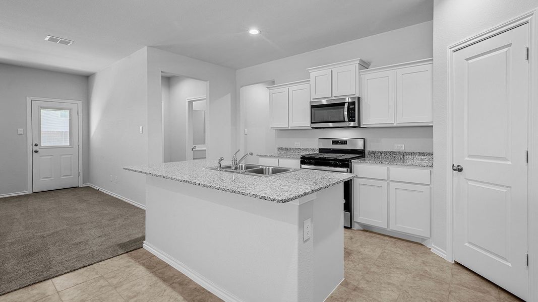 Furnished interior view inside a new home in Springhill South, Boyd (Image 6).