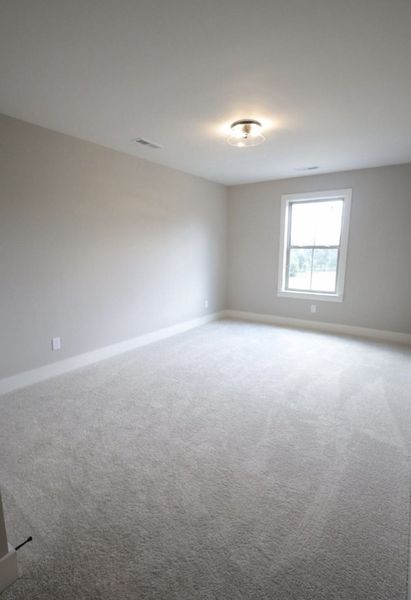 Spacious, unfurnished interior of a new home in Baker Road, Birchwood (Image 25).