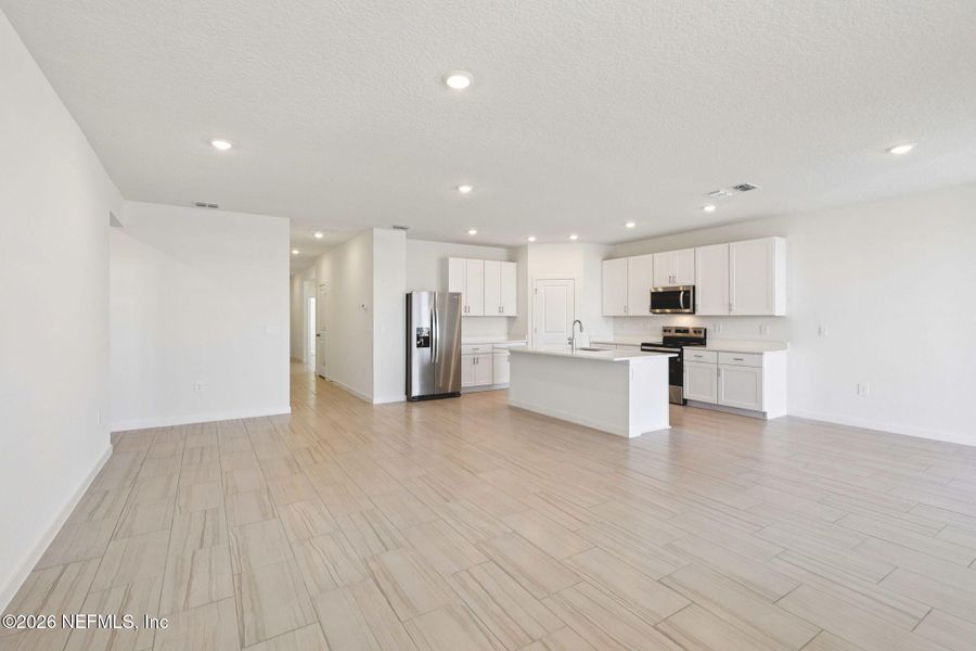 Spacious, unfurnished interior of a new home in Lakes at Bella Lago - Signature Series, Green Cove Springs (Image 34).