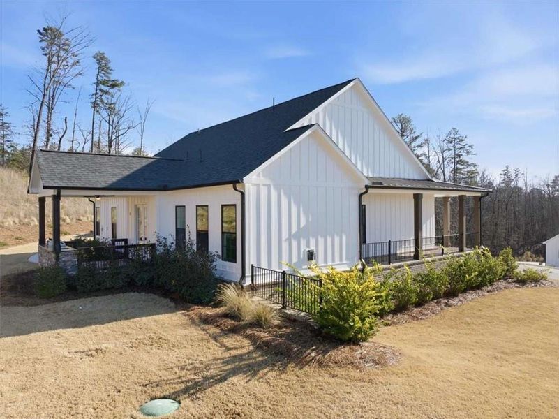 Front exterior of a new home in , Ball Ground, GA, highlighting curb appeal (Image 29). Front exterior of a new home in , Ball Ground, GA, highlighting curb appeal (Image 29).