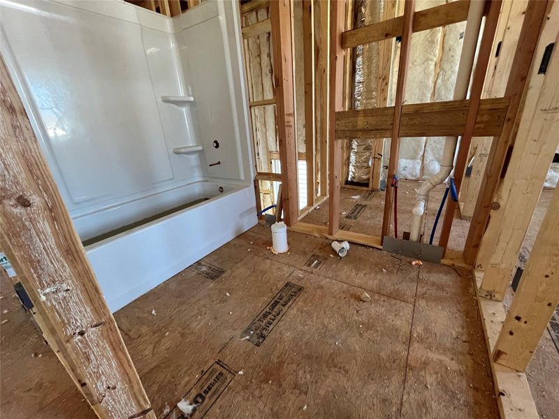 In-progress construction of a new home in The Cottages at Lariat, Liberty Hill, TX (Image 17).