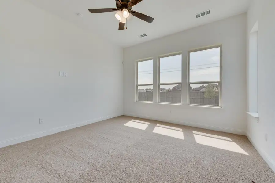 Spacious, unfurnished interior of a new home in Dominion of Pleasant Valley, Wylie (Image 34).