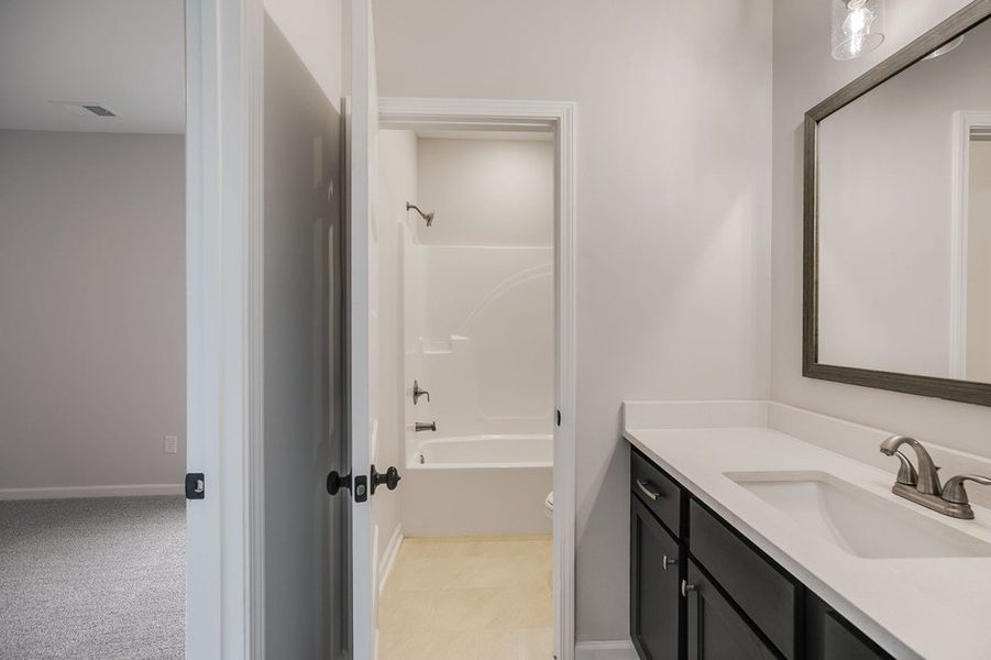 Furnished interior view inside a new home in Parmer Farms, Roopville (Image 12).