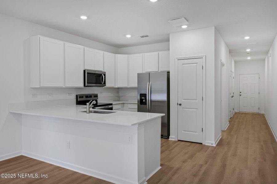 Furnished interior view inside a new home in , Jacksonville (Image 10).