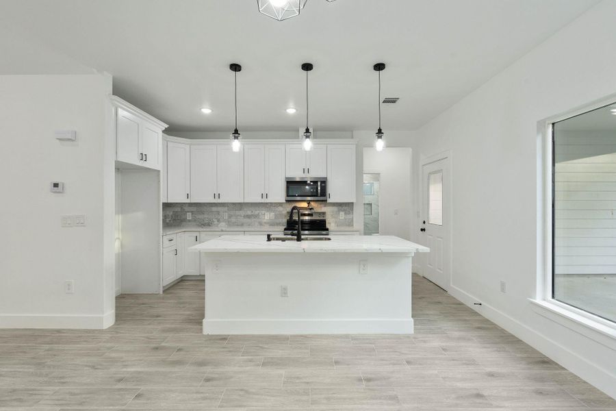 Furnished interior view inside a new home in , Willis (Image 6). Furnished interior view inside a new home in , Willis (Image 6).