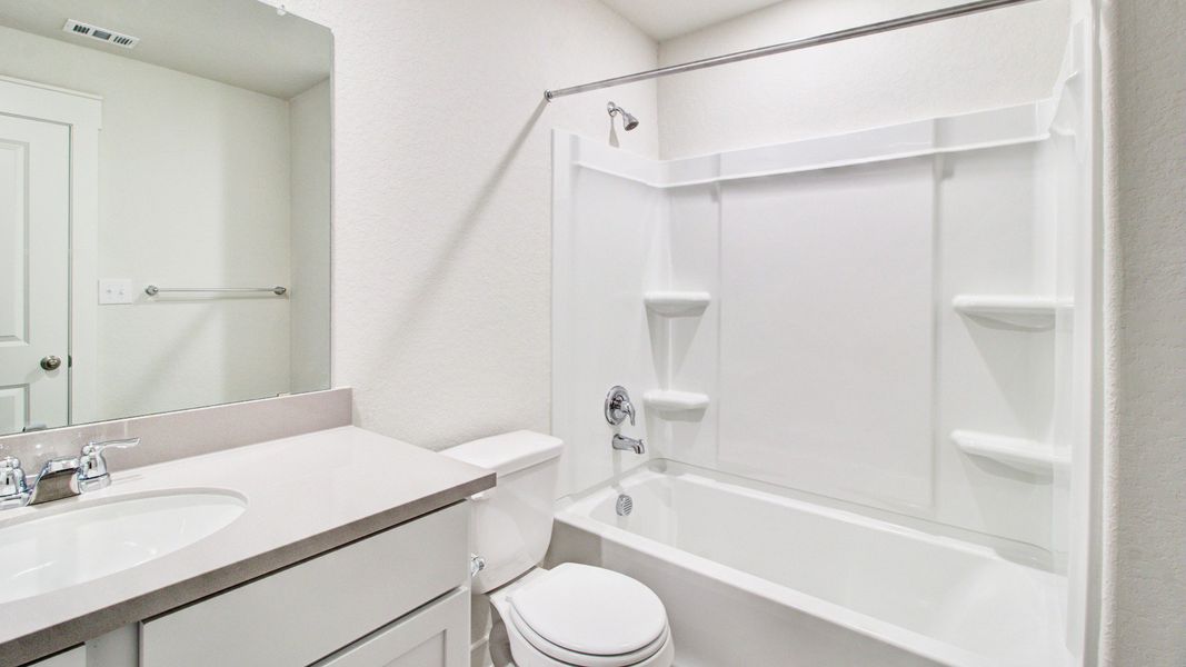 Representative furnished interior of a home built from the Paramount by Brightland Homes in Cielo, Conroe (Image 9).