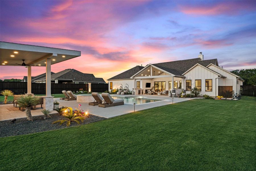 An inviting private pool and outdoor living area provide an ideal setting for relaxation. An inviting private pool and outdoor living area provide an ideal setting for relaxation.