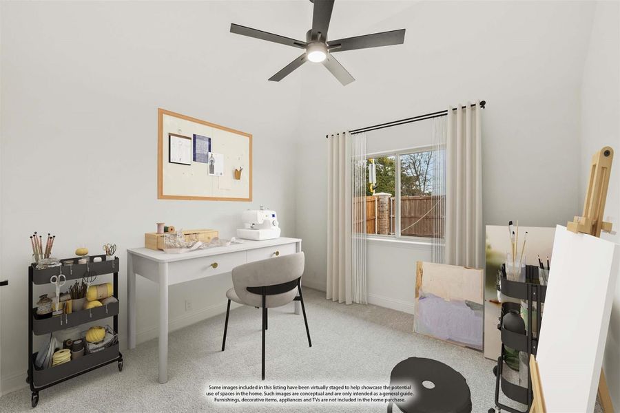 Craft room with white desk, ceiling fan, cork board, and art easel on carpet
