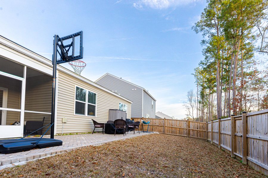 Exterior details and patio area of a home in Reserve at Mallard Crossing, Summerville (Image 25).