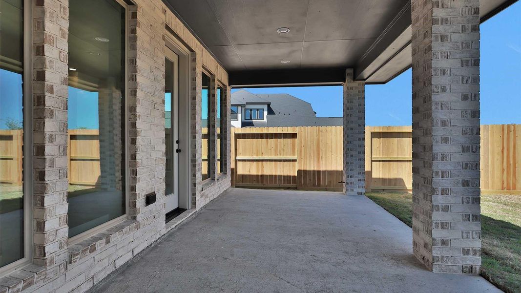 Exterior details and patio area of a home in Candela, Richmond (Image 3). Exterior details and patio area of a home in Candela, Richmond (Image 3).