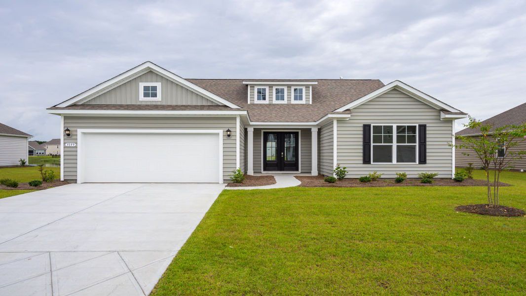 Representative exterior photo of a completed home built from the Cumberland by D.R. Horton in Brunswick Plantation, Ash, NC (Image 13). Representative exterior photo of a completed home built from the Cumberland by D.R. Horton in Brunswick Plantation, Ash, NC (Image 13).
