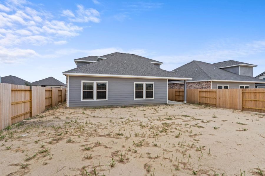 Front exterior of a new home in River Ranch Trails, Dayton, TX, highlighting curb appeal (Image 13). Front exterior of a new home in River Ranch Trails, Dayton, TX, highlighting curb appeal (Image 13).