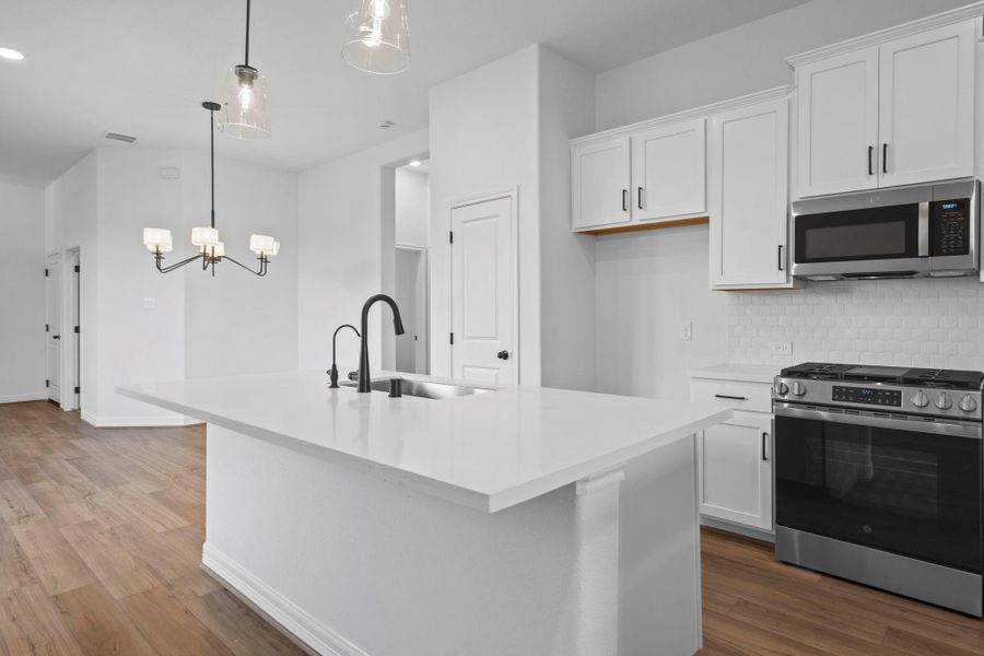 This kitchen is not only a functional space but also has ample storage. Whether you're a seasoned chef or just love to gather and enjoy good food, this kitchen is a dream come true. This kitchen is not only a functional space but also has ample storage. Whether you're a seasoned chef or just love to gather and enjoy good food, this kitchen is a dream come true.