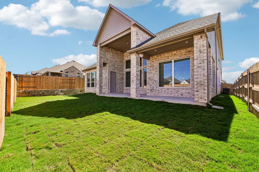 Exterior details and patio area of a home in Sunfield, Buda (Image 3).