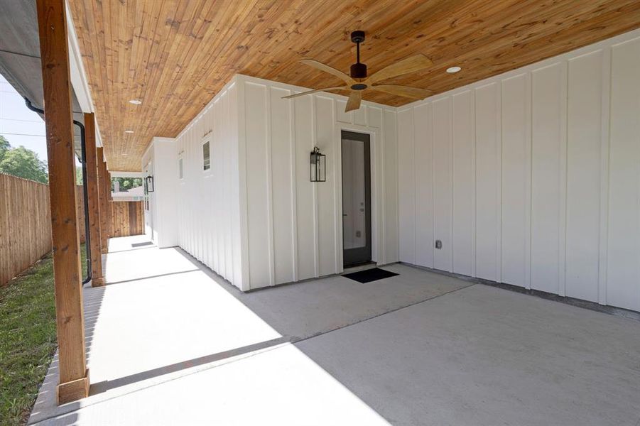Expansive Covered Porch with Cedar Posts and a Stained Tongue-And-Groove Ceiling with an Outdoor Ceiling Fan is Plumbed for a Gas Grill and includes an outlet designated for your Outdoor TV and Dimmable Lighting. Expansive Covered Porch with Cedar Posts and a Stained Tongue-And-Groove Ceiling with an Outdoor Ceiling Fan is Plumbed for a Gas Grill and includes an outlet designated for your Outdoor TV and Dimmable Lighting.