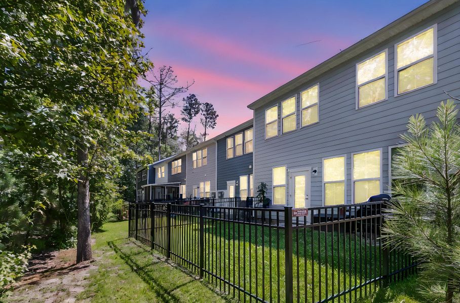Front exterior of a new home in Boykins Run Townhomes, Moncks Corner, SC, highlighting curb appeal (Image 24). Front exterior of a new home in Boykins Run Townhomes, Moncks Corner, SC, highlighting curb appeal (Image 24).