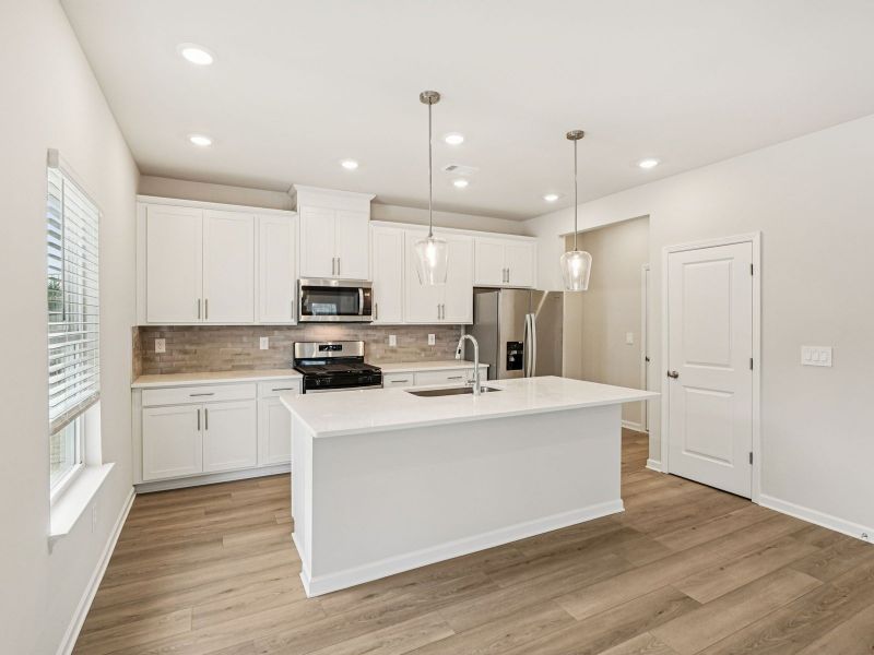 Furnished interior view inside a new home in Harmony Manor, Fairburn (Image 6).
