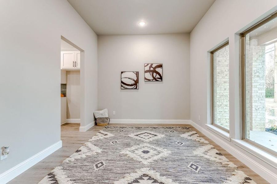 Spare room featuring light hardwood / wood-style floors