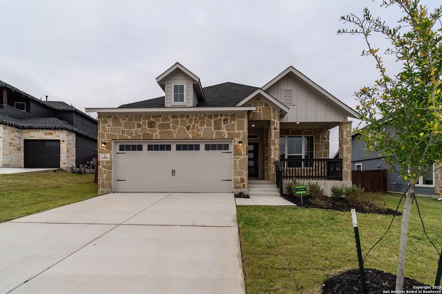 Front exterior of a new home in Homestead, Schertz, TX, highlighting curb appeal (Image 1). Front exterior of a new home in Homestead, Schertz, TX, highlighting curb appeal (Image 1).