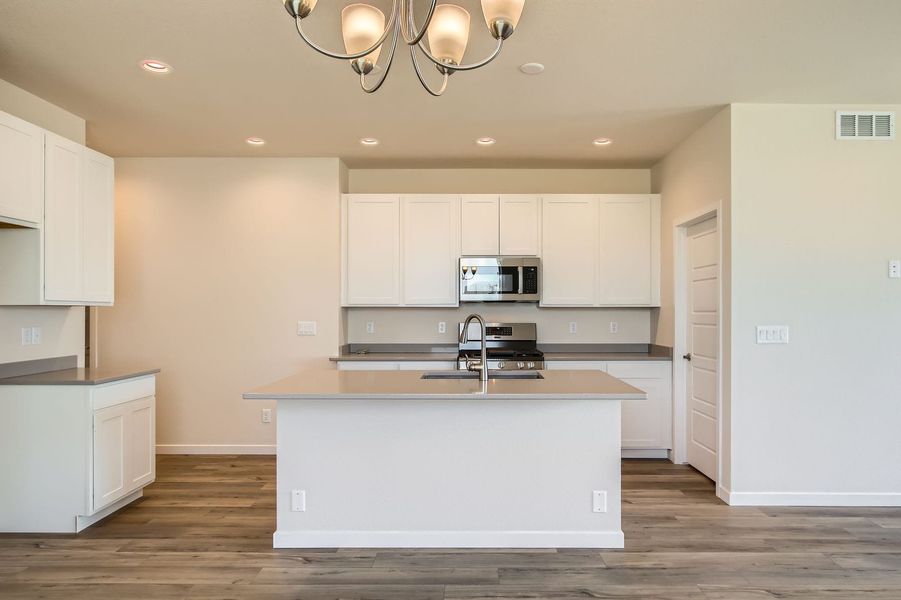 Representative furnished interior of a home built from the Pintail by View Homes in Buffalo Highlands – Commerce City, Commerce City (Image 6).
