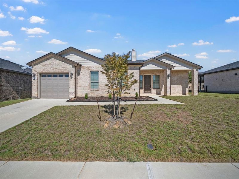 Front exterior of a new home in , McKinney, TX, highlighting curb appeal (Image 15).