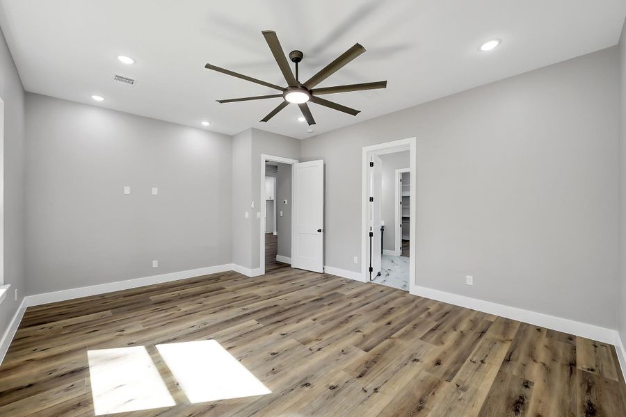 Primary bedroom positioned for privacy within this smart one-story layout